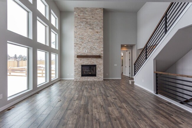 Building Photo - Exceptional 4-Bedroom Home with Dual Fireplaces, Main Level Master Suite, and Spacious Basement -...