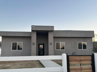 Building Photo - 9308 E Ave T 6