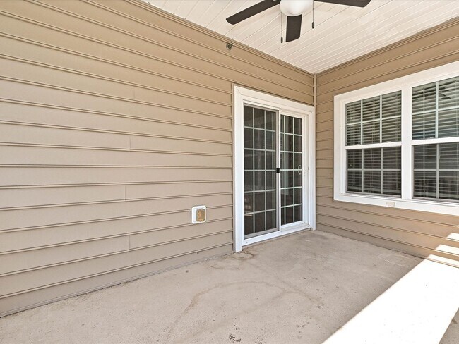 Building Photo - Stylish Condo Living with Open Concept, Garage & Outdoor Space