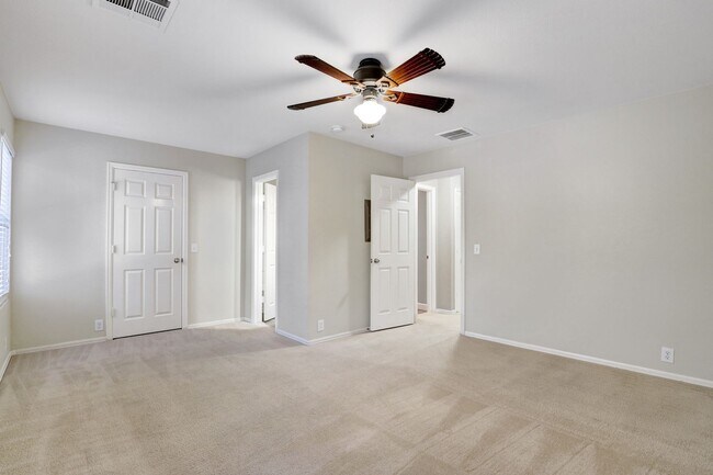 Building Photo - Stylish Two-Story Townhome with Greenbelt ...