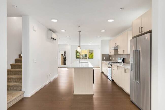 Building Photo - Modern Townhome in Upton at Crossroads Village – Stylish Living in a Prime Location