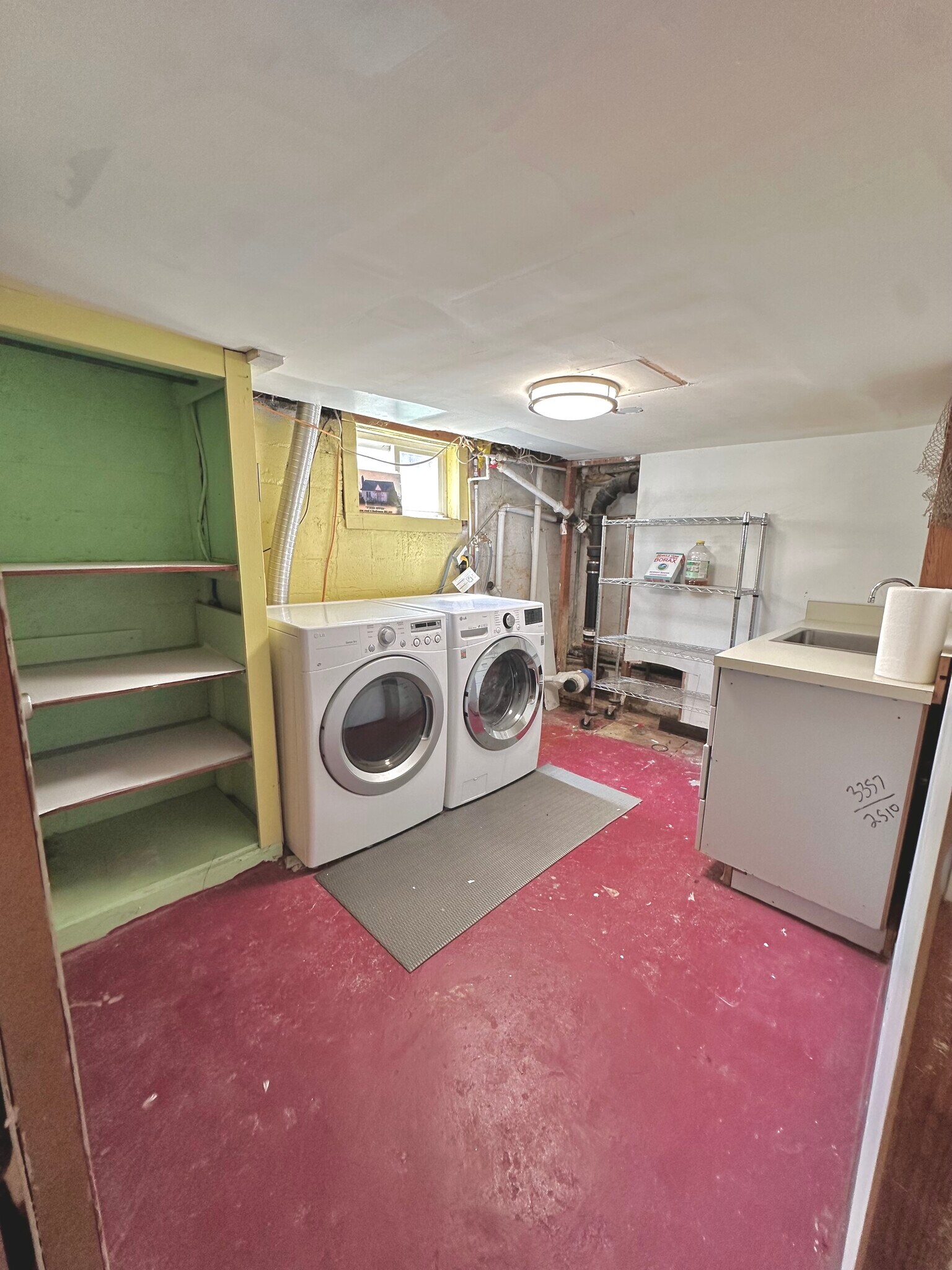 downstairs laundry - 614 Highland Dr