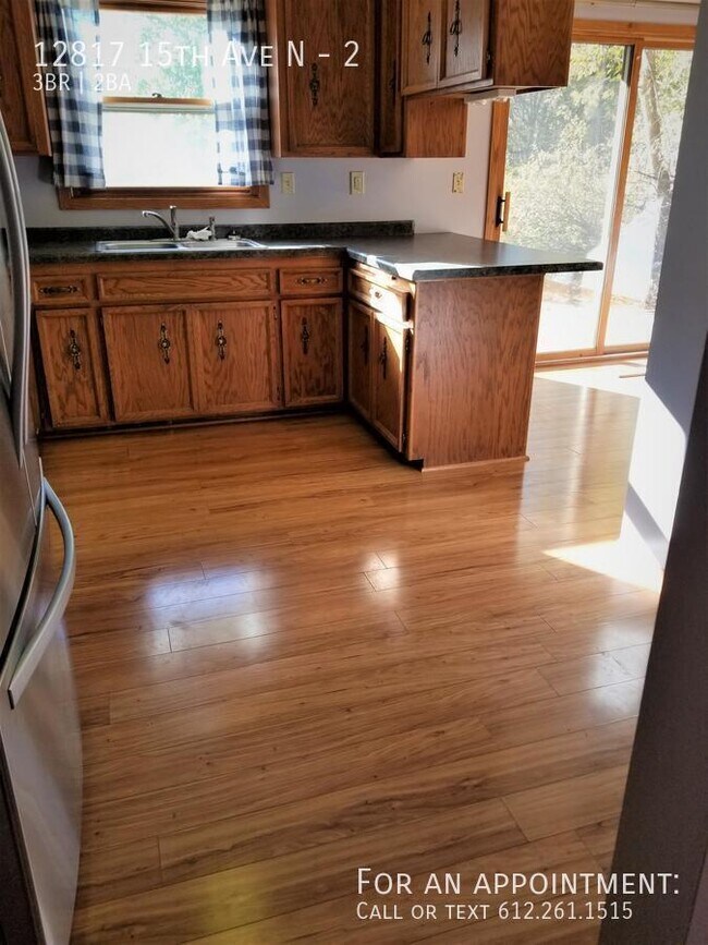 Building Photo - 12817 15th Ave N