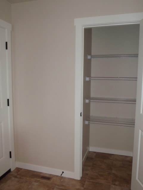 Building Photo - Newer house with attached garage. Half mon...