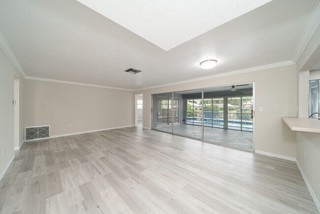 Building Photo - Welcome to your dream rental in Cape Coral! This fully remodeled, MONTH TO MONTH available home.