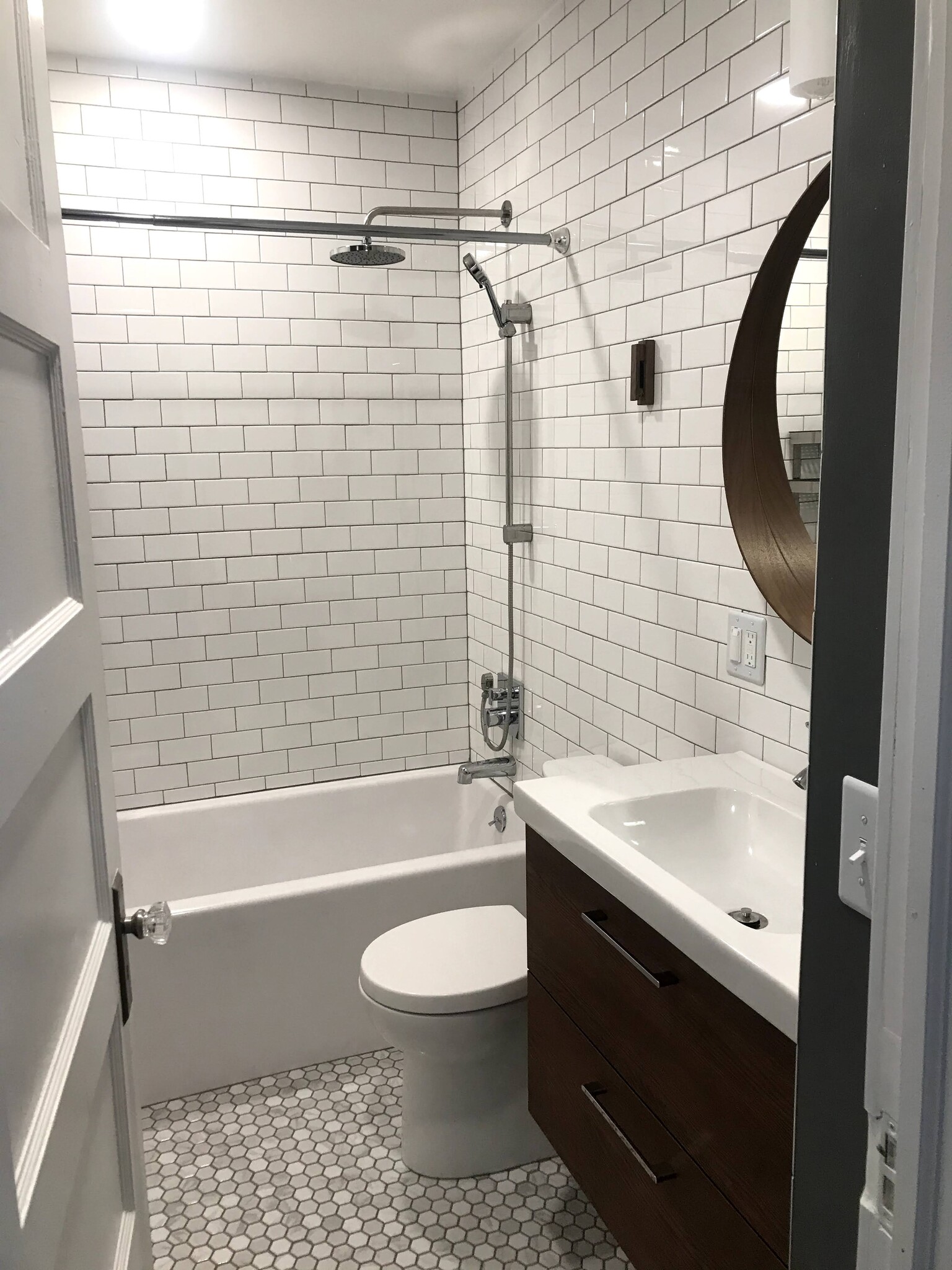 Floating vanity and a bunch of subway tile. - 1233 Jenifer St