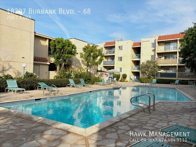 Building Photo - Stunning Top-Floor 2-Bedroom, 2-Bath Condo...