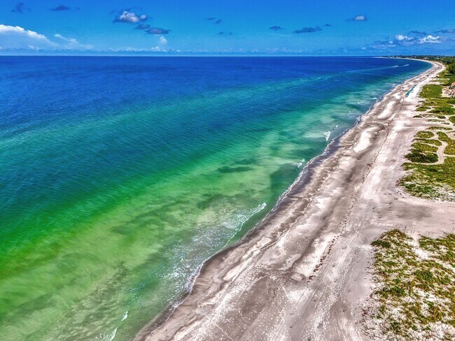 Building Photo - LUXURY LONGBOAT LIVING AT IT’S FINEST! AVA...