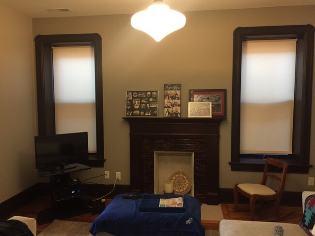 Living Room with Restored Hearth - 4248 Manchester Ave