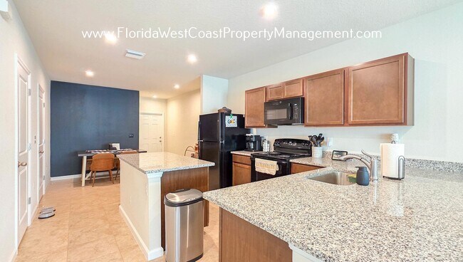 Building Photo - OUTSTANDING TOWNHOME IN LAKEWOOD RANCH! 3 ...
