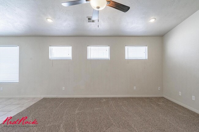 Building Photo - Fresh Carpet! Spacious 5-Bedroom Townhome