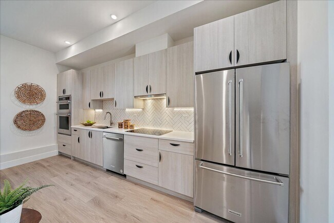 Building Photo - Luxurious New Townhome in South Sloan’s Lake