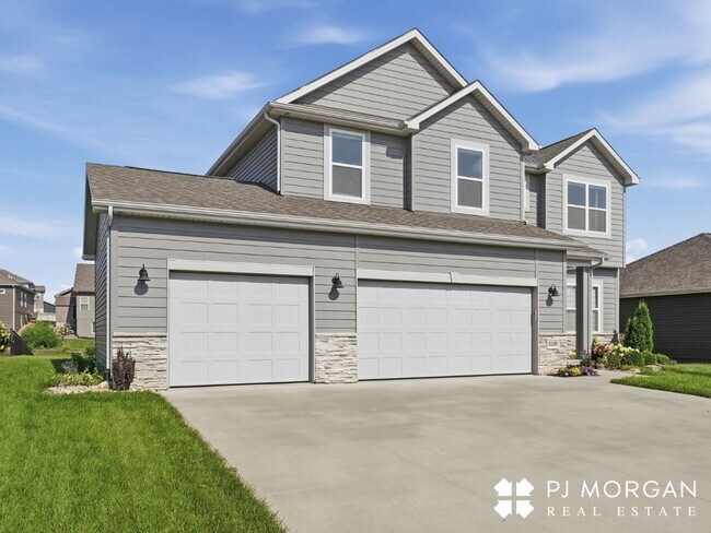Building Photo - 4 Bedroom Elkhorn Rental Home with Modern Kitchen and Ample Storage