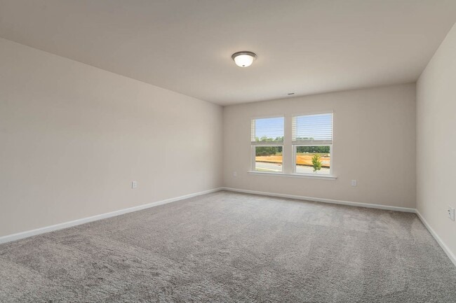Building Photo - Cozy Townhome with 2 car garage!