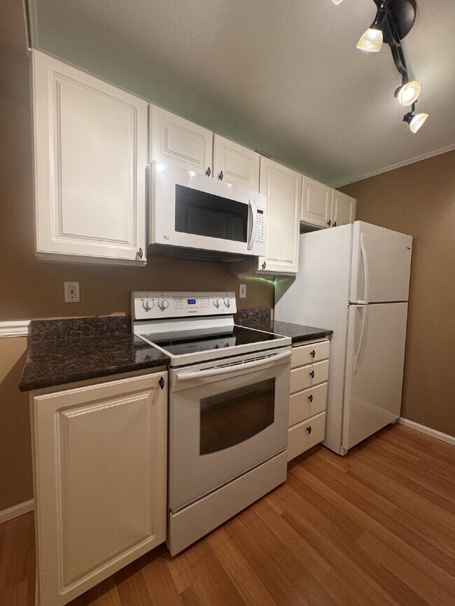 Building Photo - Downtown Woodinville Condo Available Now!