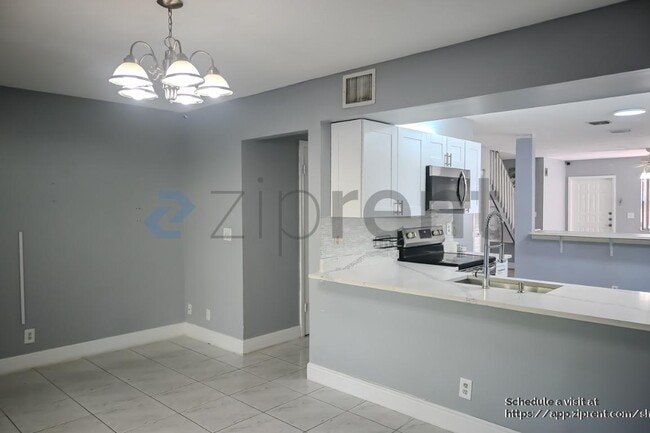 Building Photo - 9761 Riverside Dr