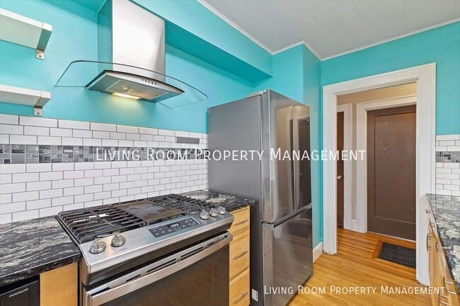 Building Photo - 6533 N Campbell Ave