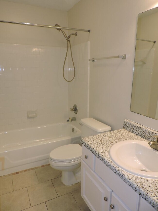 Building Photo - Easy access to shopping, interstate & Navy Federal complex!