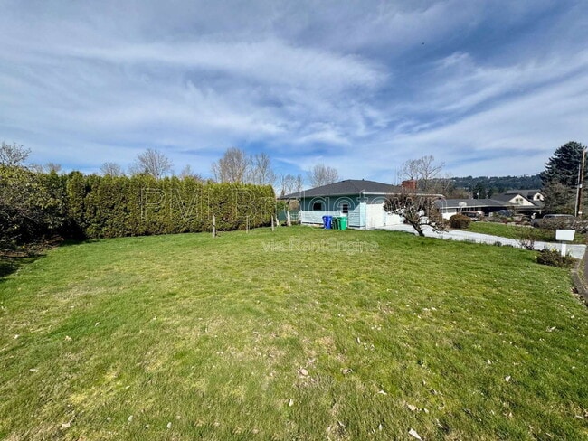 Building Photo - 6999 SE Norbert Dr