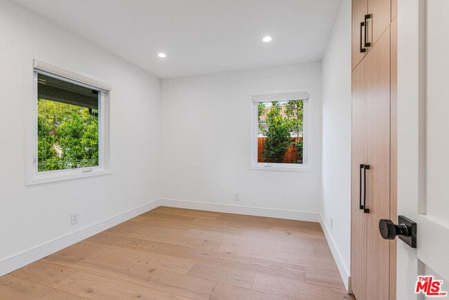 Building Photo - 5110 Garden Grove Ave