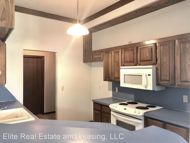 Building Photo - 3 br, 2 bath House - 10604 N. MAJOR AVE