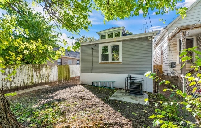 Building Photo - 7815 S Langley Ave