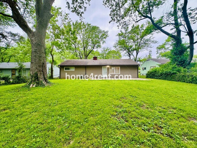 Building Photo - Lovely Three Bedroom Home in KCMO and an Updated Kitchen  w/ Granite and SS Appliances, including...