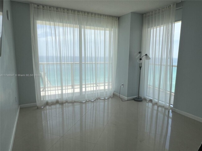 Building Photo - 16699 Collins Ave