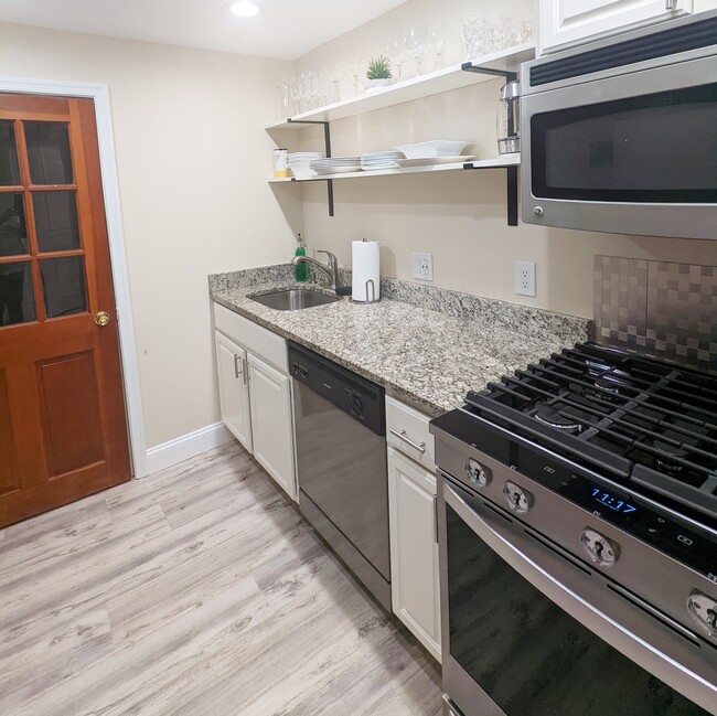 Kitchen counter + dishes - 634 Rock Creek Church Rd NW