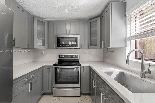 Building Photo - 6854 NW 173rd Dr