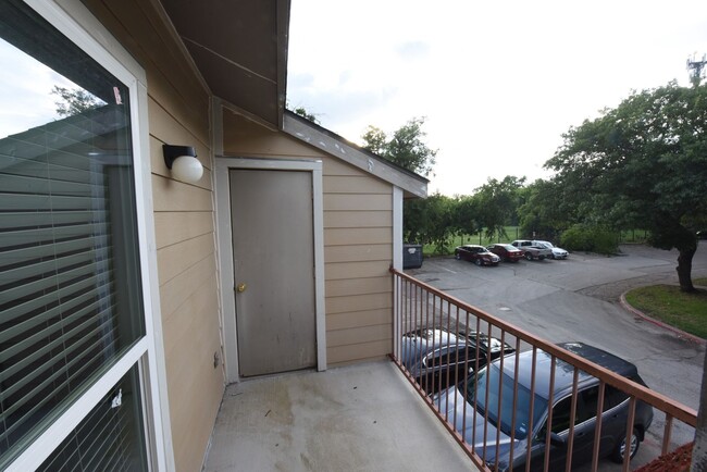 Building Photo - Second floor unit remodeled with fireplace!