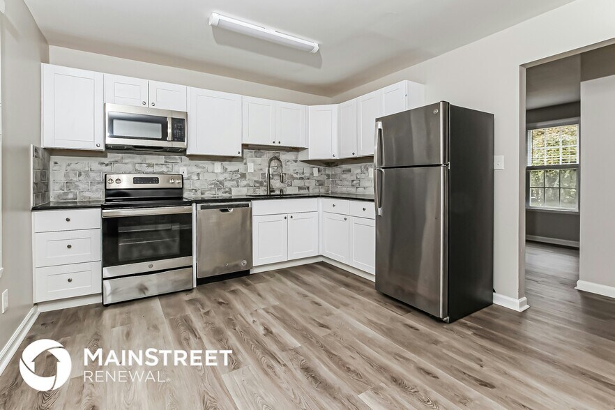 Building Photo - 1850 Adams Ave