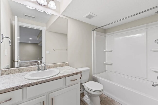 Building Photo - Upgraded 4-Bed Townhome with Finished Base...