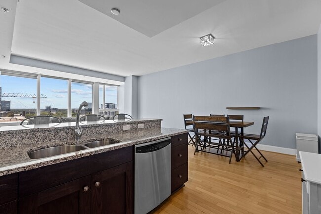 Building Photo - Modern 1-Bedroom with Downtown Raleigh Skyline Views