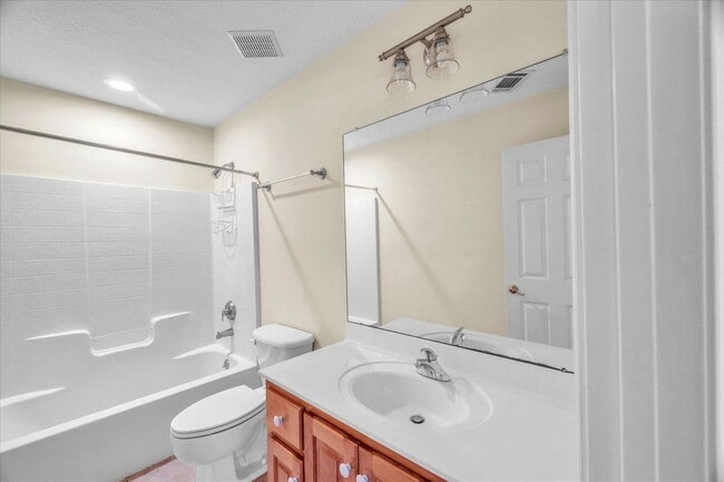 Building Photo - Stunning all-brick home on a large wooded lot