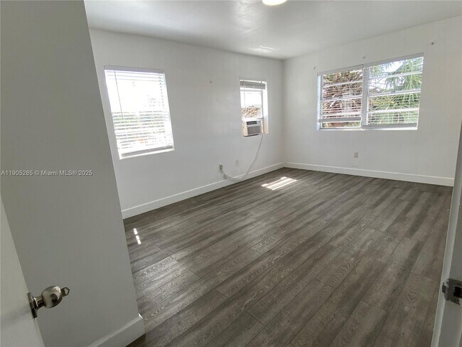 Building Photo - 9025 Harding Ave