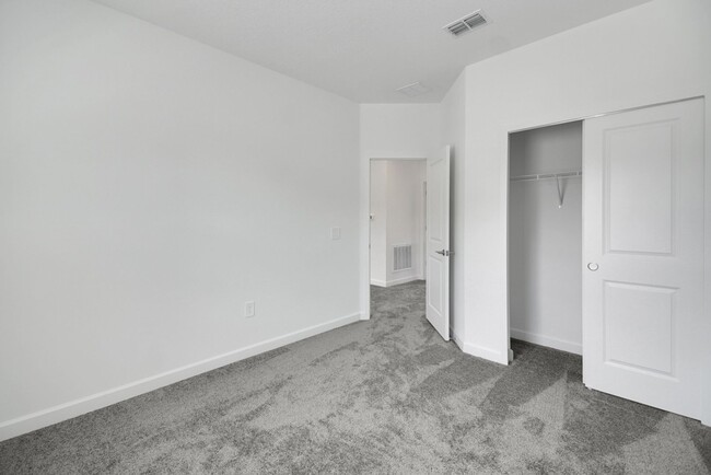 Building Photo - Stunning 4/3 in Gated Dora Parc! Water Views!