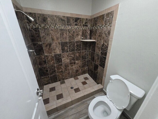 Building Photo - Rare 4BR/2BA Condo in Serra Mesa | 2 Pools, Gym & Covered Parking!
