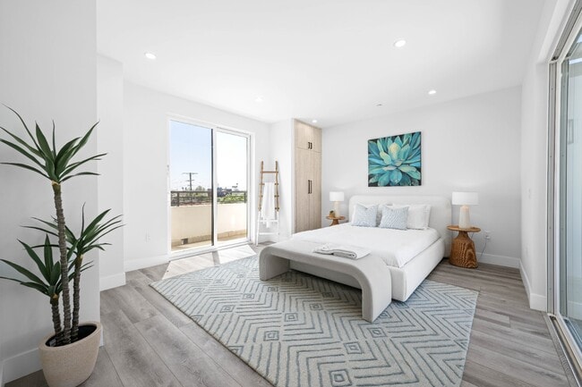 Building Photo - Stunning brand-new 3 Bedroom 4 Bathroom townhouse with private garage and rooftop balcony!