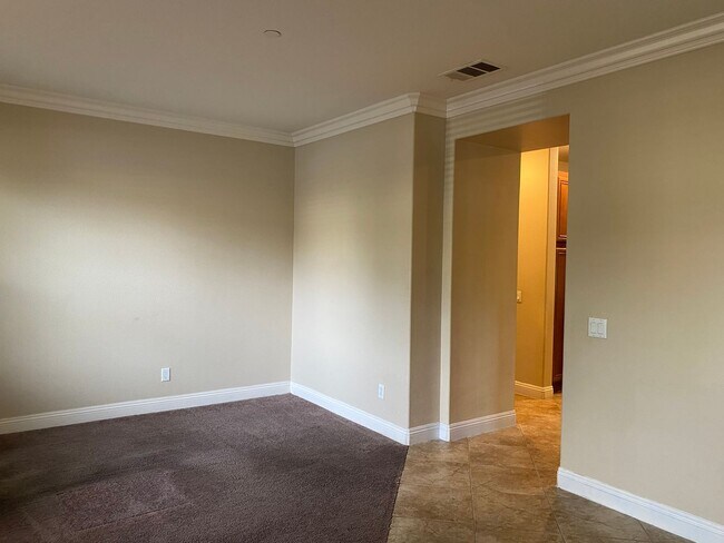 Building Photo - 3 bedroom/Patio 2 story, attached garage Great Access to the I215.