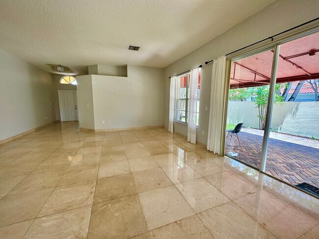 Building Photo - 10530 NW 52nd Terrace