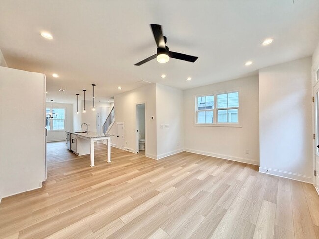 Building Photo - **OFFERING 1/2 OFF FIRST MONTH'S RENT** Newly Built 4BD, 3.5BA End-Unit Raleigh Townhome in a Gre...