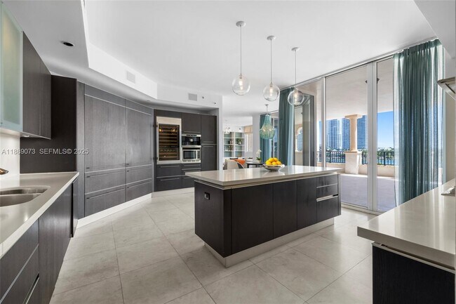 Building Photo - 7133 Fisher Island Dr