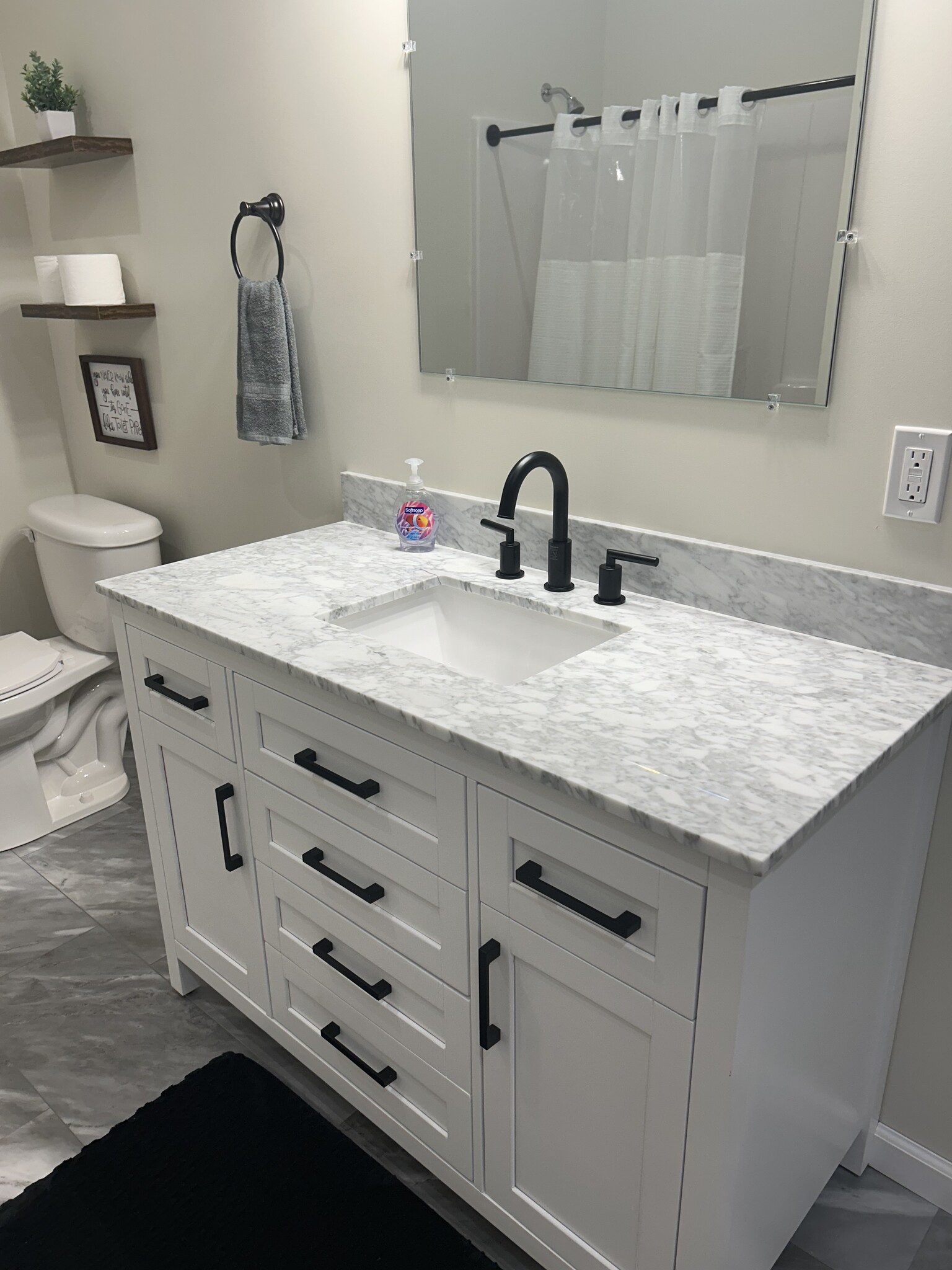 Bathroom vanity and mirror - 812 Commercial St