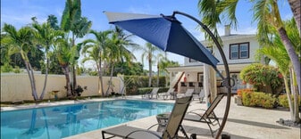 Pool with lanai - Capri Apartments