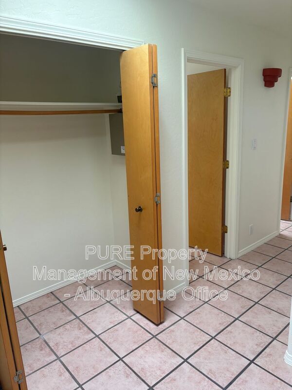 Building Photo - 8220 W Raintree Dr NE