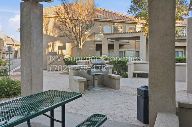 Building Photo - SW!!! 2 Bedroom Condo 1st Floor!! 2 Garage!! Gated!! Community Pool!! Fitness Room!! 2 Primary Be...