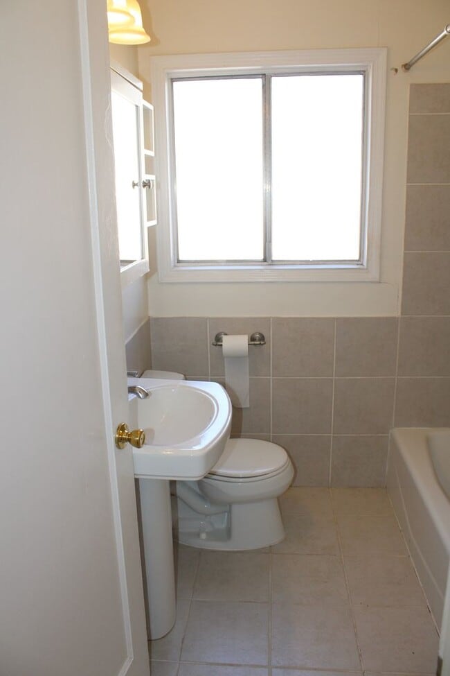 Building Photo - ***COMING SOON*** Three Bedroom, 1 1/2 Bathroom House with 2 Garages and Side Yard Access in Pitt...