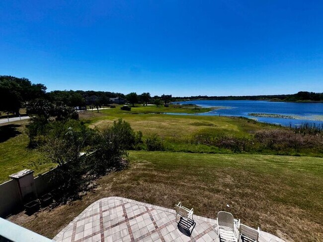 Building Photo - 3 Bedroom 2.5 Bath Cinnamon Bay Home with Stunning view, and Hardwood Flooring!