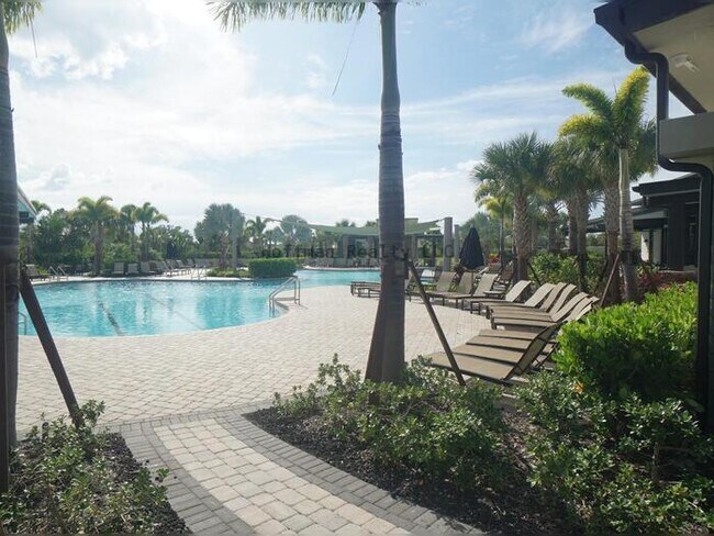 Building Photo - Stunning 5-Bedroom Lakeview Home in River Landing, Wesley Chapel